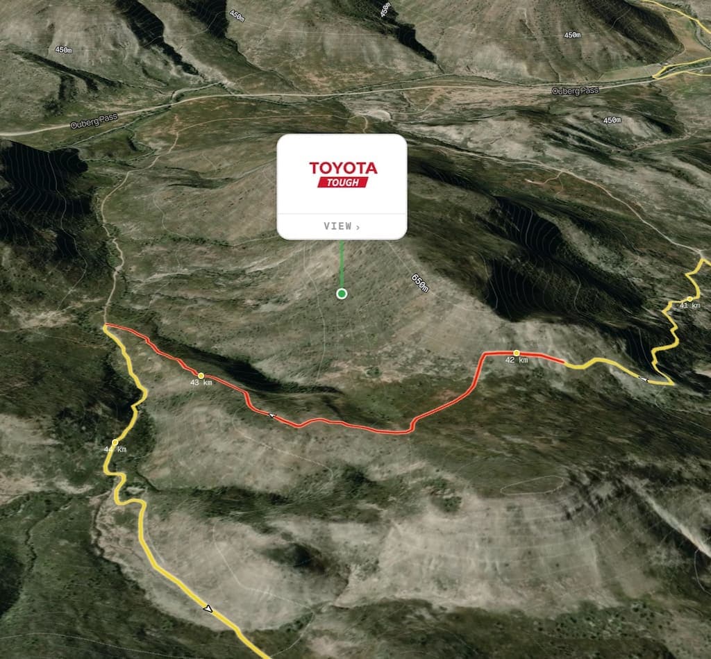 A Toyota sponsor logo marker on the 3D race course map, with a View link to sponsor content